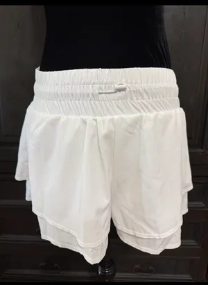 JoyLab White Athletic Flowy Activewear Workout Shorts - Size small. Gently warn and excellent condition. Under shorts with pockets. Measurements approximately 14” waste, not fully stretched out x 13.5” long x 13” rise. Non-smoking home. priced to sell at as is condition. Don’t like my price, make reasonable offer! And thank you for checking my closet. thumbnail 2
