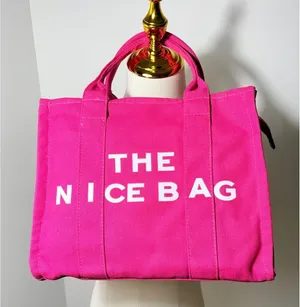 Vibrant Pink Canvas Tote Bag with Zipper Closure and Adjustable Shoulder Strap thumbnail 1