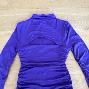 Oh Polly - Long Sleeve Cut Out Ruched Mini Dress in Purple thumbnail 2
