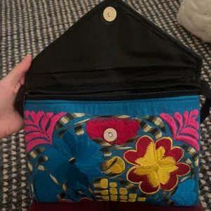 Blue and yellow crossbody bag with a unique, hand-sewn design No flaws and perfect condition/never used Zipper and additional pockets inside thumbnail 5