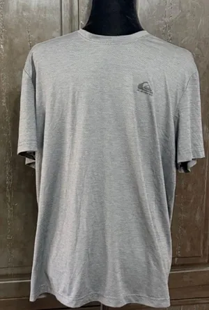 QuikSilver Gray /Charcoal T-shirt - size Large. Gently Warn & in excellent condition. Innovate your future printed on back tail. True color is the ones with measurements. Measurements approximately 22” from armpit to armpit x 26” long. Non-smoking home. priced to sell at as is condition. Don’t like my price, make reasonable offer! And thank you for checking my closet. thumbnail 1