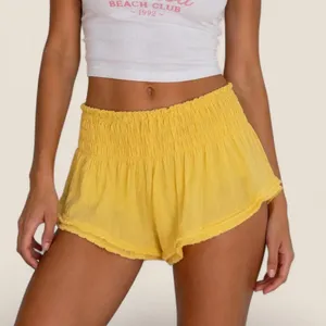 Anthropologie yellow gauzy smocked flowy micro shorts size XXS thumbnail 1