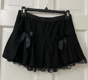 Spirit Halloween True Y2K Black Satin and Lace Mini Skirt M/L Bow Clubware Festival Goth Emo thumbnail 1