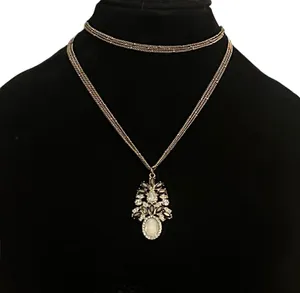 Multi strand gold tone rhinestone and pendant necklace thumbnail 1