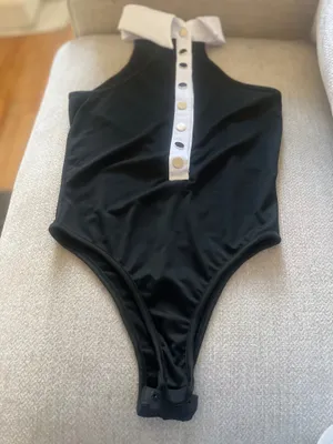 Seatyrocks Elevate your style with this chie black and white bodysuit. Perfect for any occasion, it features a sophisticated button- up design thumbnail 3