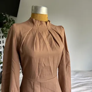 Tan mock neck knee length modest dress thumbnail 2