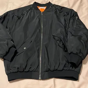 Article size M black with orange lining zip front bomber jacket EUC Size M thumbnail 2