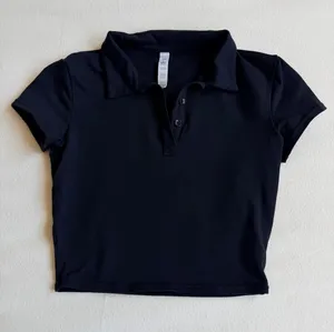 Alo Yoga Black Cropped Polo thumbnail 1