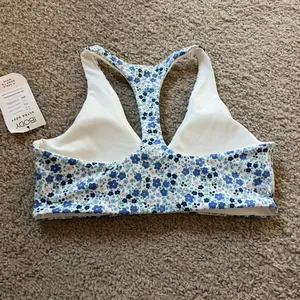 Ultra soft Blue and white Floral Racerback plunge Sports Bra never worn thumbnail 6