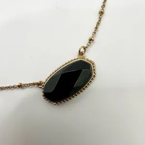 Black and gold tone pendant necklace thumbnail 9