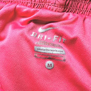 Nike Womens Size Medium Dri-FIT Running Shorts Pink‎ White Purple Athletic Gym thumbnail 4