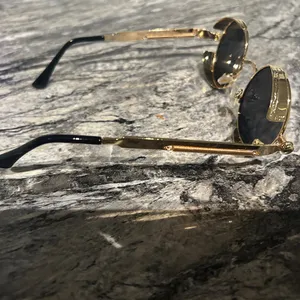 Round Gold and Black Sunglasses thumbnail 10