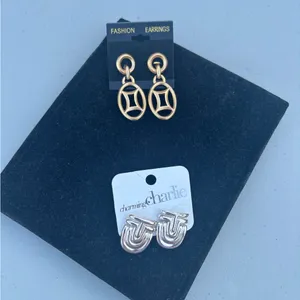 Charming Charlie Silver Earrings 1.5” long and Hanging gold earrings 2” long. thumbnail 1