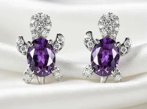 Silver Turtle Stud Earrings with Purple Gemstones thumbnail 1