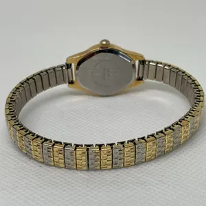 Women gold silver tone watch 20mm round case quartz analog stretch 6.5” running thumbnail 4