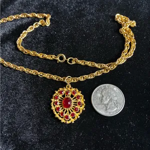 Vintage gold-tone necklace with a red crystal and cabochon pendant. 18” thumbnail 3