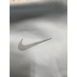 Nike‎ One Womens High Rise 8 Inch Biker Shorts Light Blue FZ6758-440 XS…. thumbnail 4
