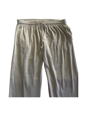 PINK Victoria's Secret Cream Velour Lounge Pants-size large Casual lounge pants from PINK by Victoria's Secret. Elastic drawstring waistband for a comfy fit. Smooth fabric with a relaxed wide-leg silhouette, has hand pockets, embroidered “pink” on one leg, 93% polyester and 7% elasttane, excellent condition Measurements: Waist: side to side 17-21 inches Rise: 11 inches Inseam: 30 inches thumbnail 3