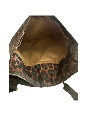 COACH-CHEETAH PRINT NYLON CROSSBODY BAG NO H1376-F77479 Coach crossbody with bold leopard print. Compact silhouette with adjustable shoulder strap. Front zip pocket and main compartment for essentials. Gold-tone logo plaque and hardware accents, front zip pocket, back slip pocket with magnetic closure, adjustable strap, great condition Measures:19.5x9.5 inches thumbnail 6