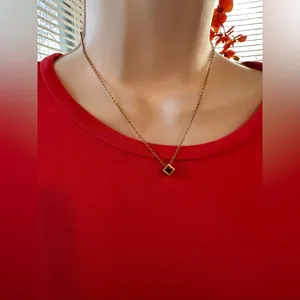 Beautiful Gold Necklace with a Ruby Colored Stone thumbnail 1