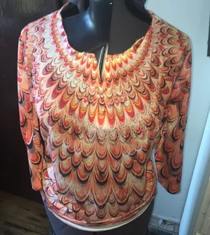 Chico’s 2 tangerine peacock raw hem, ruched blouse thumbnail 1