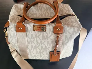 Michel Kors Beige Duffle Bag thumbnail 1