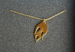 Gold Flame Pendant Necklace thumbnail 1