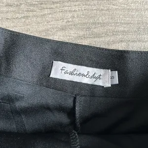 Black pleated skirt thumbnail 3