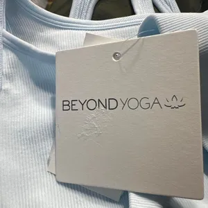 X359. Beyond Yoga - light blue sports bra thumbnail 3