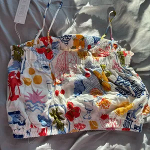 Anthropologie Summer Sticker Print Top thumbnail 4