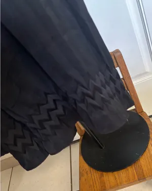 Large Entro Black short sleeve tie back chevron design hem Pleated romper. thumbnail 4