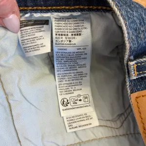 Levi's 501 Original Denim Shorts Womens 28 Distressed 2.5"‎ Festival Dark Wash thumbnail 7