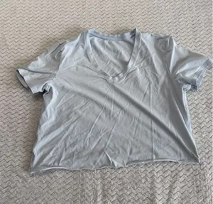 Lululemon Womens Light Blue V-Neck Short Sleeve Cropped flaw cut Tee Shirt thumbnail 1