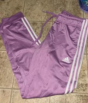 Purple adidas pants  thumbnail 1