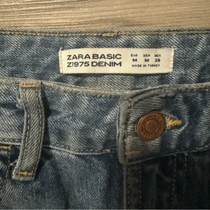 Zara size Medium denim skirt with floral details thumbnail 3