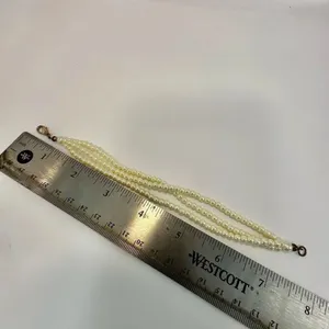 Triple strand faux pearl bracelet thumbnail 6