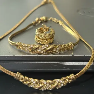 Avon Gold Tone Braided Crystal Necklace and Bracelet Set stamped NR thumbnail 1