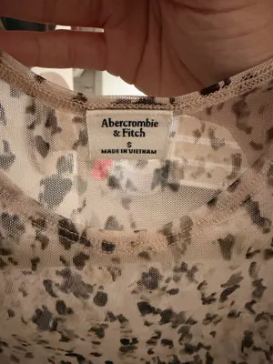 Abercrombie & Fitch leopard print draped mesh top in size S thumbnail 6