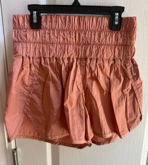 FP Movement by Free People Coral Pink Smocked Waist Athletic Shorts thumbnail 1