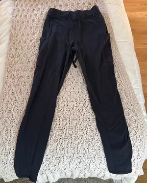 XS black Alo leggings with tie and pockets thumbnail 1