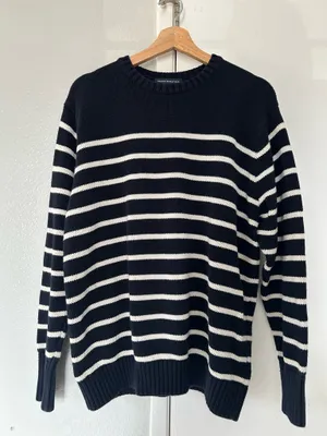 Classic oversized Brandy Melville "Brianna" striped sweater in navy blue and white. Super soft, chunky, and breathable knit made from 100% cotton. thumbnail 1