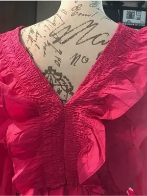 Feminine Ruffled V-Neck Peplum Blouse in Hot Pink thumbnail 6