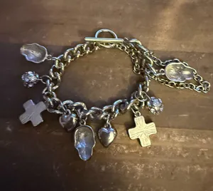 Chunky silver tone crosses, hearts and skulls charm bracelet thumbnail 1