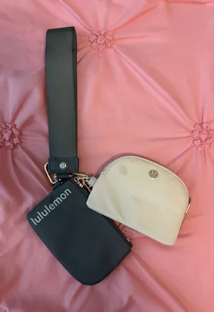 Gray and white Lululemon dual keychain thumbnail 1