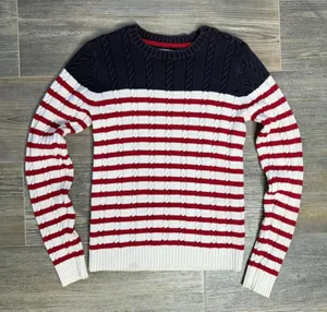 Vintage Tommy Hilfiger nautical fisherman cable knit sweater with red and white stripes at the hem and navy blue upper 100% cotton Made in Japan size small Has some minor yellowing spots as pictured barely noticeable on the hem and on the sleeves Ptp 15” Waist 13.5” Length 22” Inseam 19.25” Stretchy fabric #preppy #vintage #cableknit #fisherman #nautical thumbnail 1
