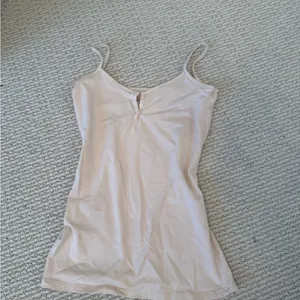 Brandy Melville Women's Cream Spaghetti Strap Top thumbnail 2