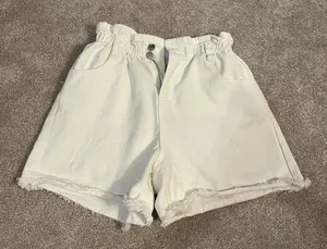Princess Polly white high waisted denim shorts with the elastic waistband thumbnail 1