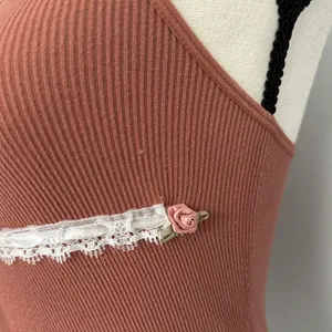 terracotta rust tank with white lace, three mauve pink rosebuds, & a white ribbon bow 🌷🤍✨ thumbnail 4
