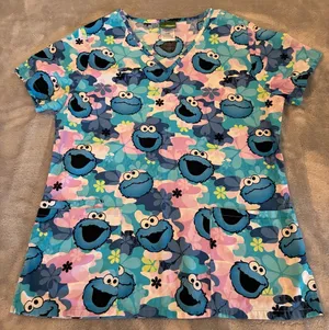 Sesame Street Women’s Cookie Monster Print Scrub Top - Blue Multi Size Small thumbnail 1