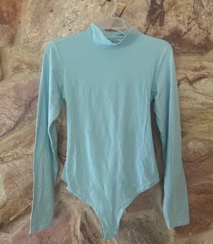 Free people Straps In The Back Bodysuit size medium thumbnail 1